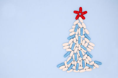 High angle view of traditional windmill against white background