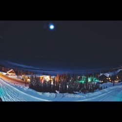 Illuminated street light at night