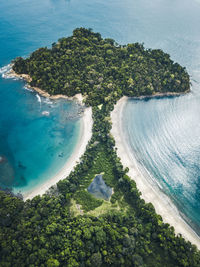 Aerial view of island amidst sea