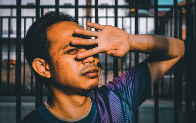 Portrait of young man looking away