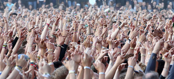 High angle view of crowd enjoying at music concert