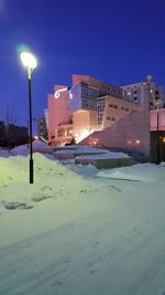 View of illuminated buildings at night