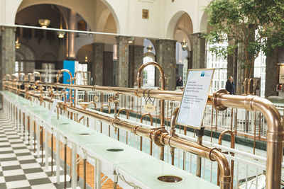 Row of empty chairs outside building