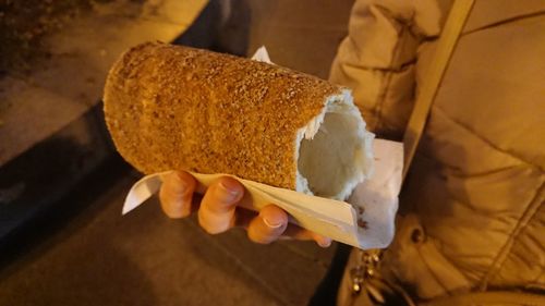 Close-up of hand holding ice cream