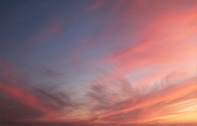 Low angle view of dramatic sky during sunset