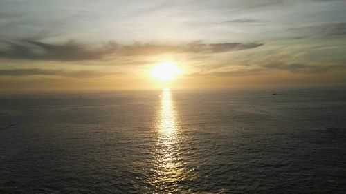 Scenic view of sea at sunset