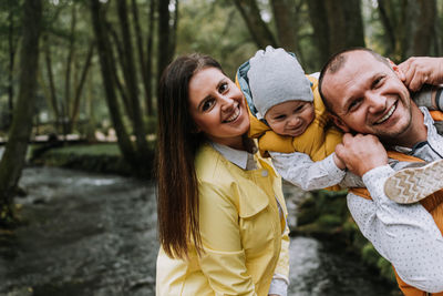 Family time, mom and dad with child