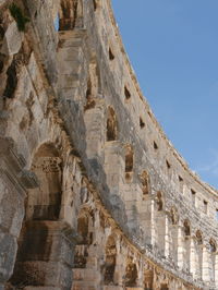 Low angle view of historical building against clear sky