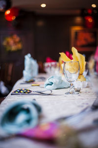 Empty wineglass and decoration on table