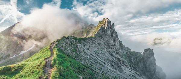 High angle view mountain against sky during foggy weather