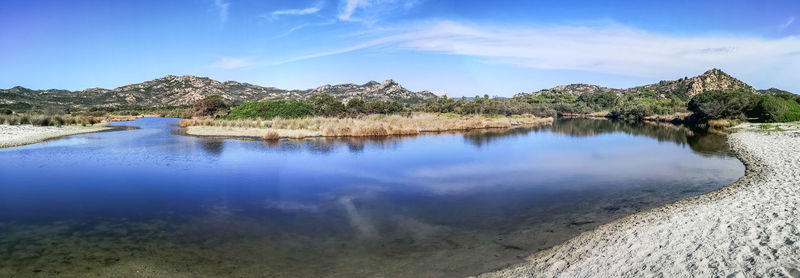 Ultra wide panorama of the beautiful beach of berchida in sardinia