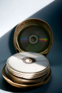 Close-up of camera on table against white background