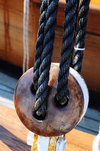 Close-up of pulley in boat