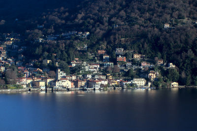 Aerial view of townscape by sea