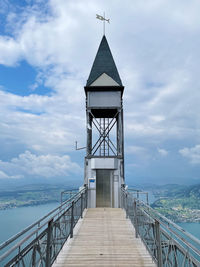 Pier over sea against sky