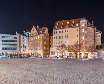 Buildings against sky in city at night