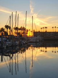 Boats moored at harbor