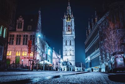 Illuminated buildings in city at night