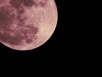 Scenic view of moon against clear sky at night