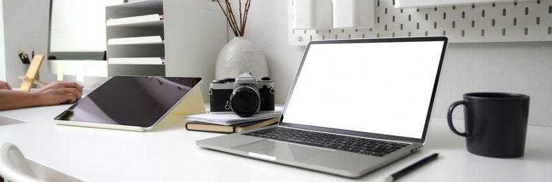 Man using laptop on table