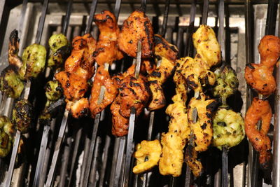 Close-up of meat on barbecue grill