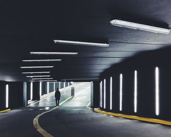 Man in parking garage tunnel