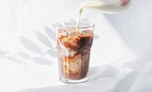 Close-up of ice cream in glass on table