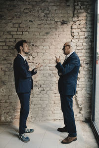 Senior and mid-adult businessman having a meeting