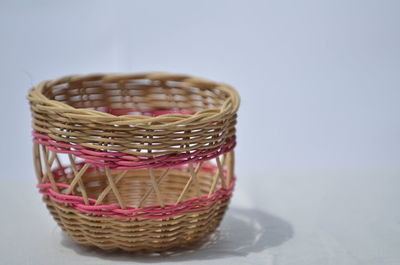 Close-up of wicker basket on table