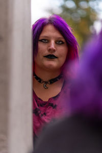 Portrait of young woman looking away