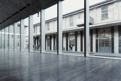 Reflection of building on glass window