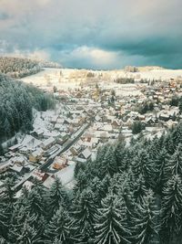 Scenic view of landscape against sky during winter