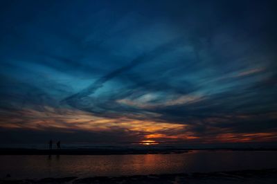 Scenic view of sea at sunset