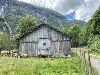 House on field against sky