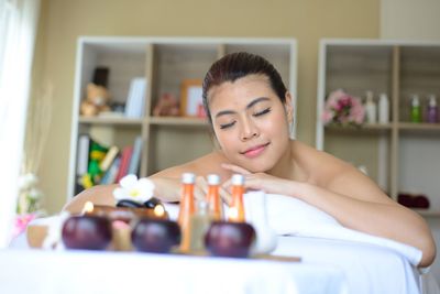 Portrait of woman relaxing at home