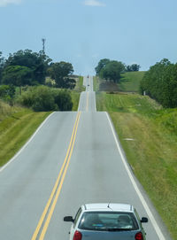 Empty road against sky