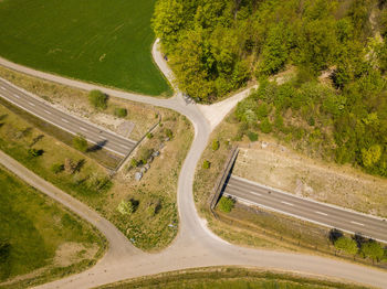 High angle view of road amidst trees