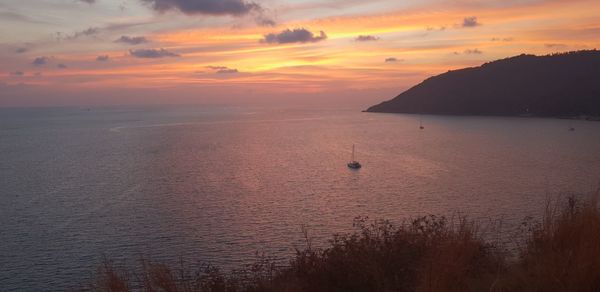 Scenic view of sea against sky during sunset