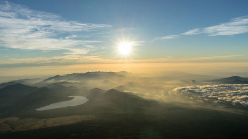 Scenic view of mountains against sky during sunset