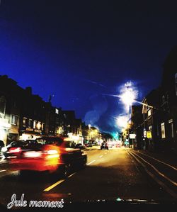 Cars on road at night