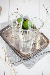 Close-up of empty glass in tray