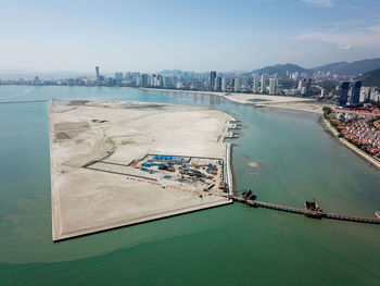 Construction of reclamation new island near gurney drive.