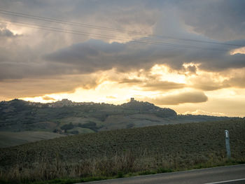 Scenic view of landscape against sky during sunset