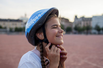 Young woman wearing hat