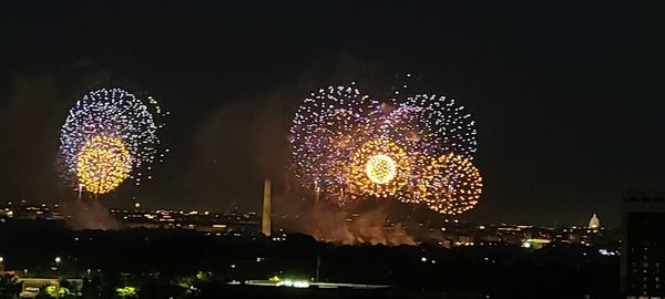 Firework display at night