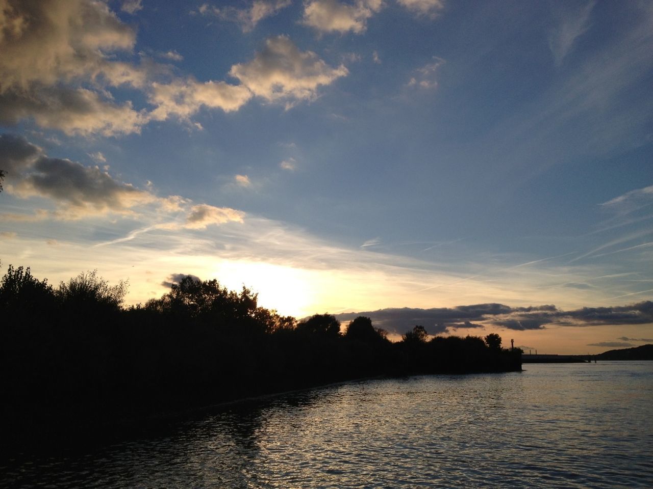 sunset, water, sky, silhouette, tranquil scene, tranquility, scenics, waterfront, beauty in nature, tree, reflection, cloud - sky, nature, lake, cloud, idyllic, river, rippled, calm, outdoors