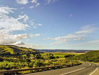 Country road through scenic landscape