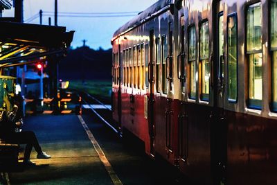 Train at railroad station at night