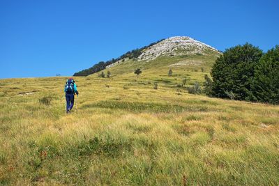 Senior woman hiking in velebit mountain, croatia