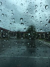 Full frame shot of wet window in rainy season